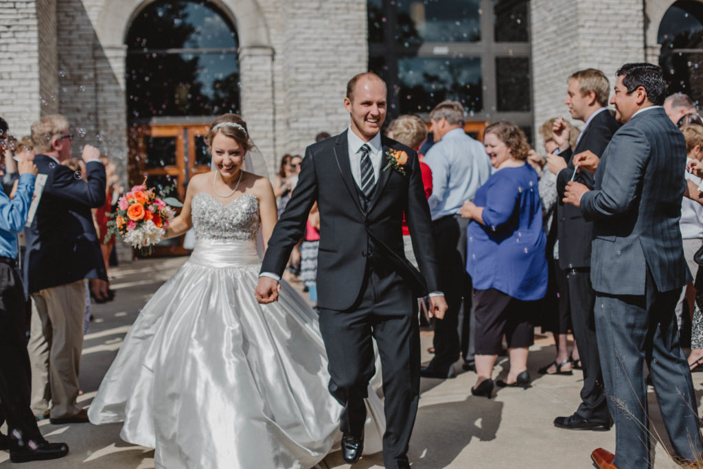 Jon and Maggie leaving the church after the wedding