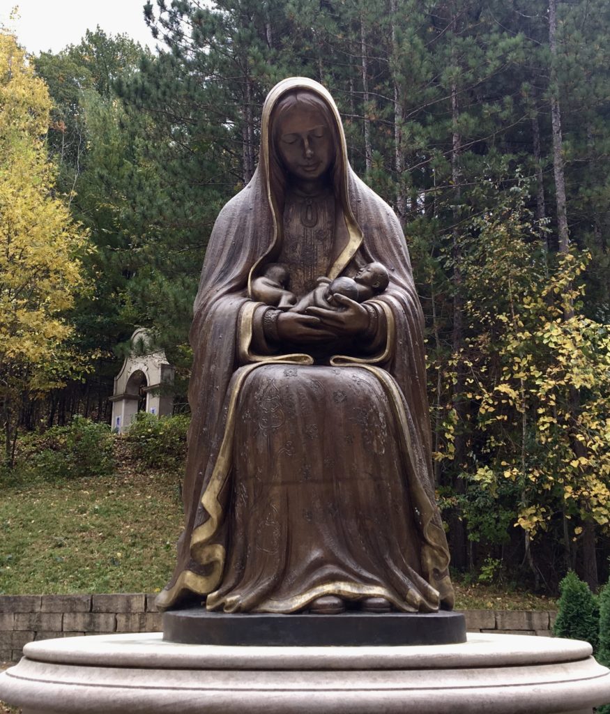 Statue of Mary holding tiny unborn babies